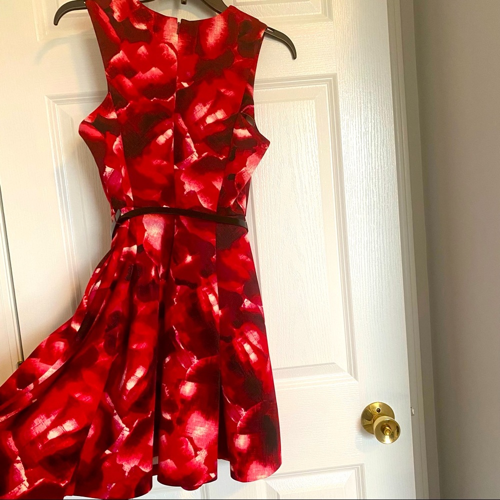 Red fit and flare dress by Eva Longoria